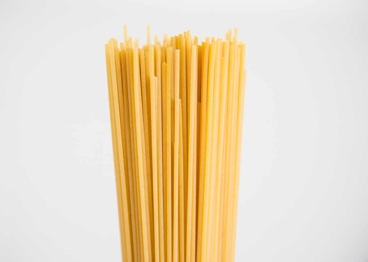 Learn how to cook your favorite varieties of pasta with these easy instructions. All my best tips and tricks for cooking pasta to perfection every time. Spaghetti noodles.